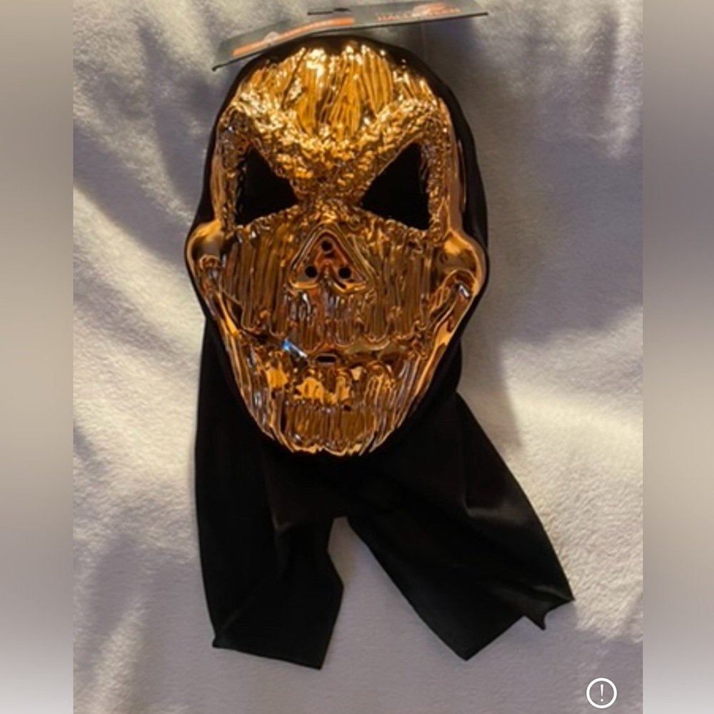 Gold/ Metallic  Over the head mask.